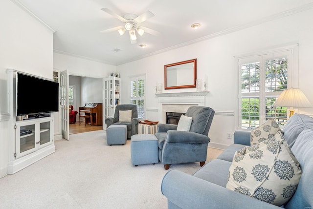 174 Revetment Ln, Mount Pleasant, SC 29464 - living room featuring crown molding, a ceiling fan, a fireplace, and carpet floors