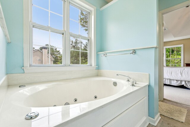 174 Revetment Ln, Mount Pleasant, SC 29464 - bathroom featuring ensuite bath and a tub with jets