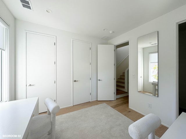 bedroom featuring light wood-type flooring