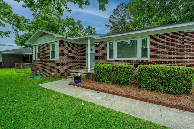 2567 Mona Ave, Charleston, SC 29414 - single story home with brick siding and crawl space