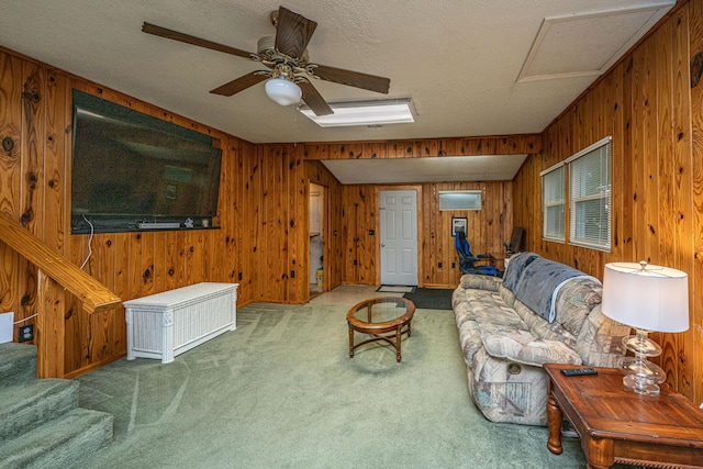 2567 Mona Ave, Charleston, SC 29414 - carpeted living area featuring wood walls, a ceiling fan, attic access, stairway, and a textured ceiling