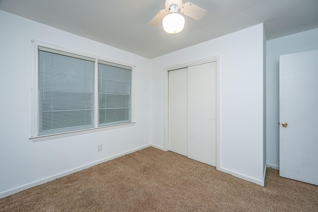 2567 Mona Ave, Charleston, SC 29414 - unfurnished bedroom featuring carpet floors, a closet, baseboards, and a ceiling fan