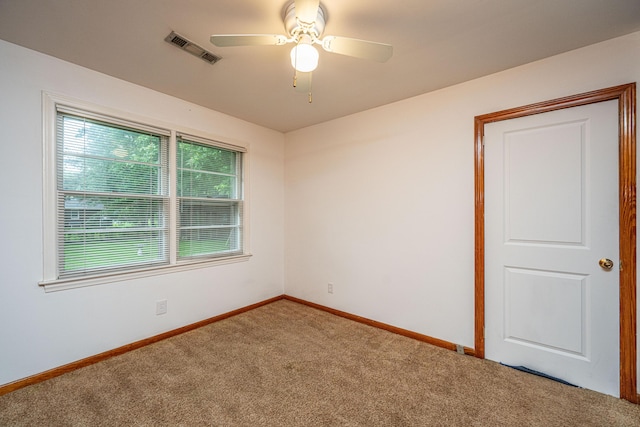 2567 Mona Ave, Charleston, SC 29414 - empty room featuring carpet flooring, baseboards, and a ceiling fan