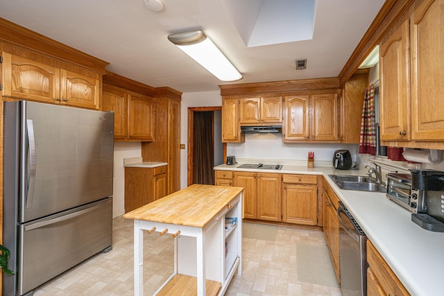 2567 Mona Ave, Charleston, SC 29414 - kitchen with appliances with stainless steel finishes, a sink, ventilation hood, open shelves, and brown cabinetry