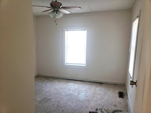 empty room with ceiling fan