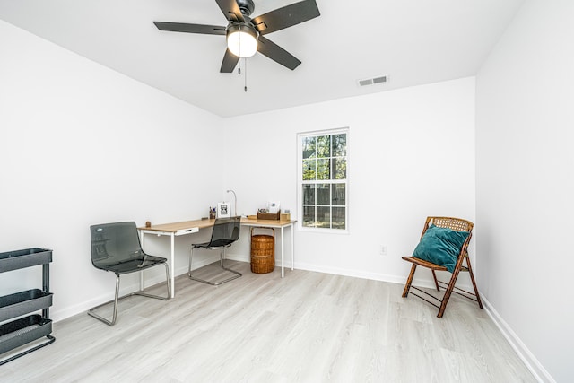 office area featuring light hardwood / wood-style floors and ceiling fan