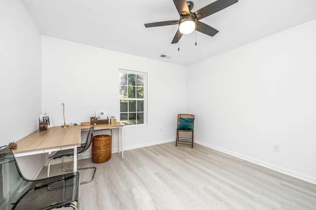 home office featuring ceiling fan and light wood-type flooring