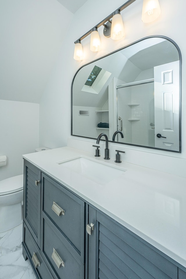 bathroom with toilet, vanity, vaulted ceiling, and an enclosed shower