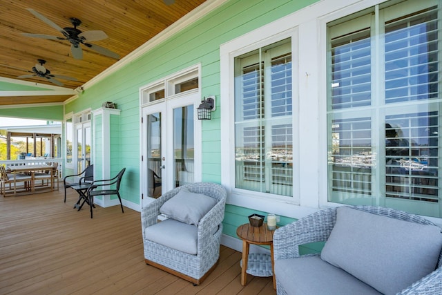 68 W 9th St Unit B, Folly Beach, SC 29439 - wooden deck featuring a ceiling fan, french doors, and outdoor dining space