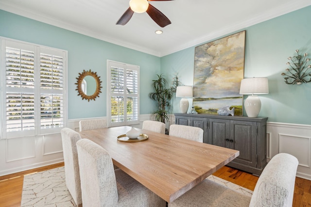 68 W 9th St Unit B, Folly Beach, SC 29439 - dining space with wood finished floors, wainscoting, ceiling fan, ornamental molding, and recessed lighting