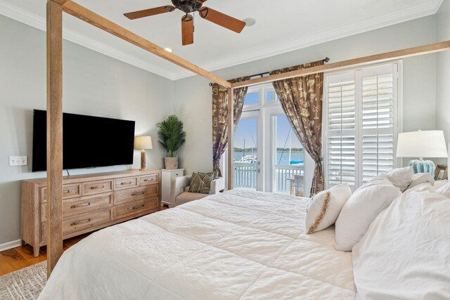 68 W 9th St Unit B, Folly Beach, SC 29439 - bedroom featuring wood finished floors, access to exterior, crown molding, and ceiling fan