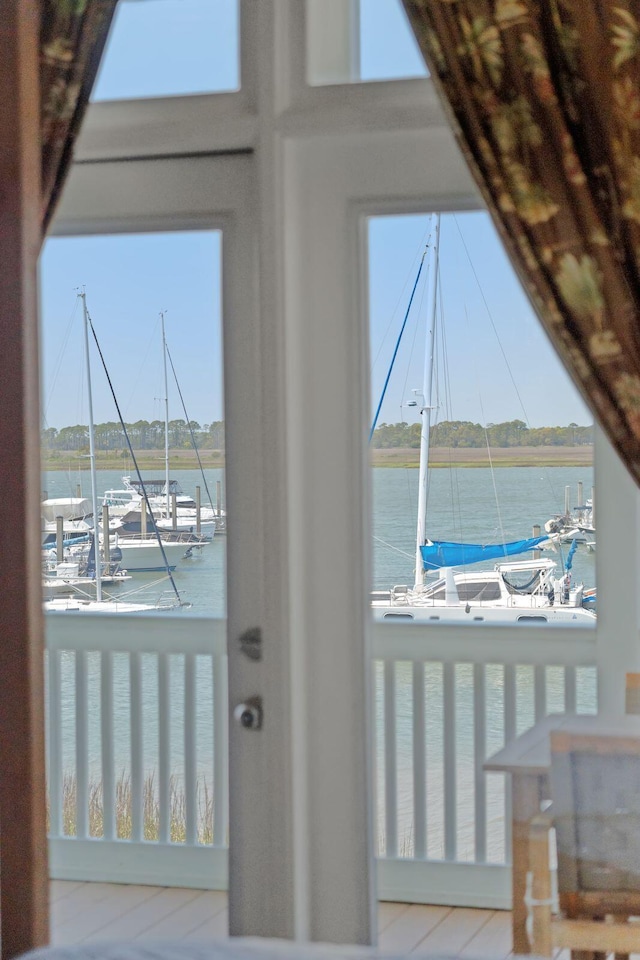 68 W 9th St Unit B, Folly Beach, SC 29439 - entryway featuring a water view and a healthy amount of sunlight
