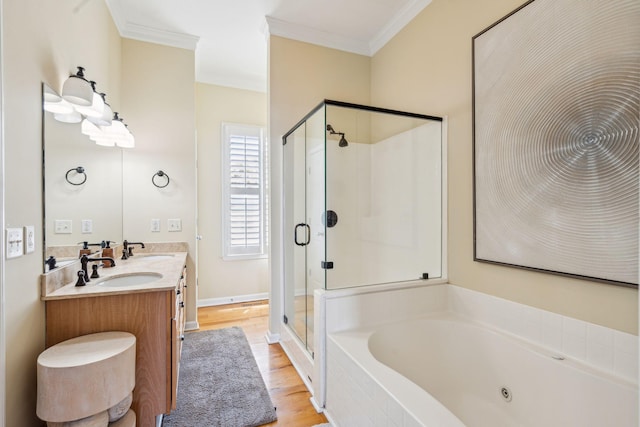 68 W 9th St Unit B, Folly Beach, SC 29439 - bathroom with a sink, double vanity, a shower stall, a tub with jets, and ornamental molding