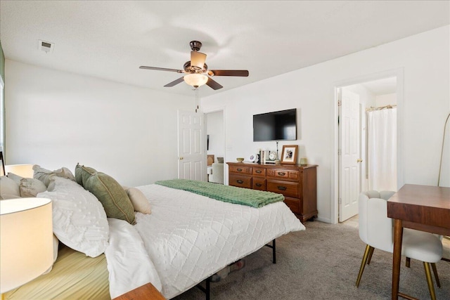 carpeted bedroom with ceiling fan