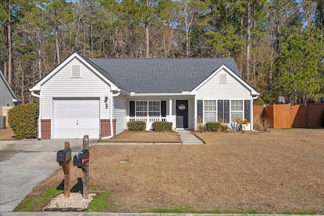 ranch-style house with cooling unit and a garage