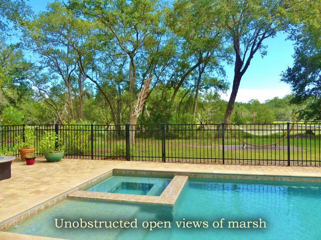 view of pool featuring an in ground hot tub and a patio