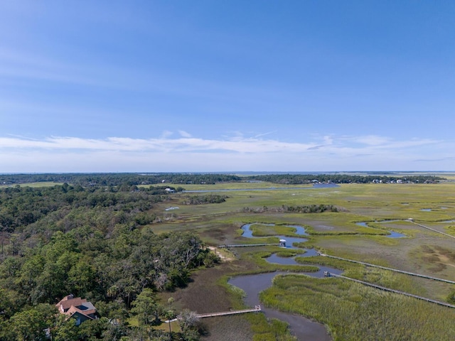 drone / aerial view featuring a water view and a rural view