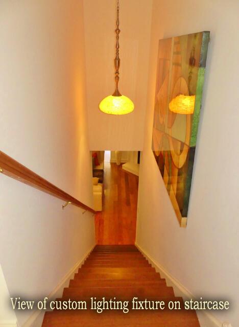 stairs with hardwood / wood-style flooring