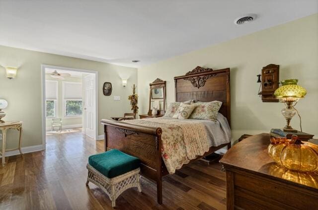 bedroom with wood-type flooring