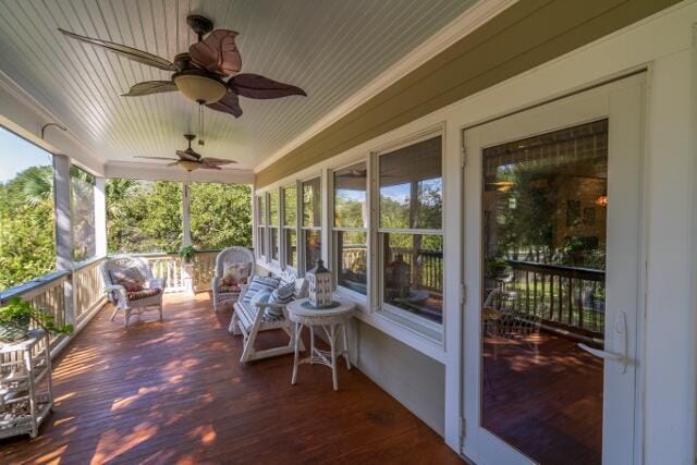 deck featuring ceiling fan and covered porch