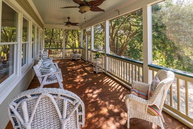 sunroom / solarium with ceiling fan