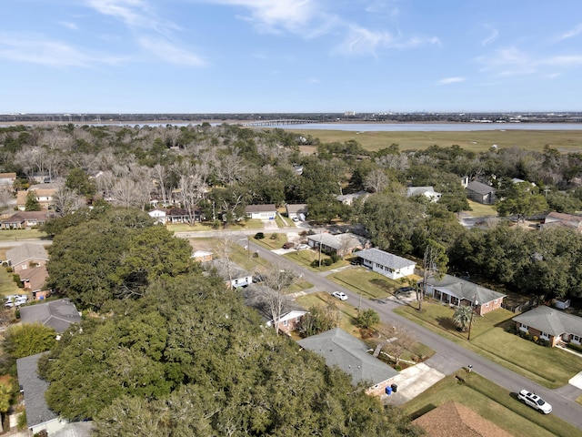 drone / aerial view featuring a water view and a residential view