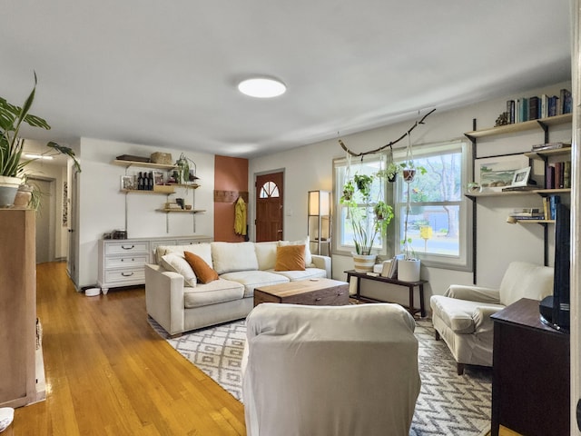 living area featuring light wood-style flooring