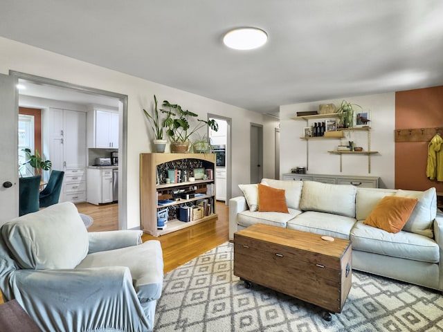 living area featuring light wood-style floors