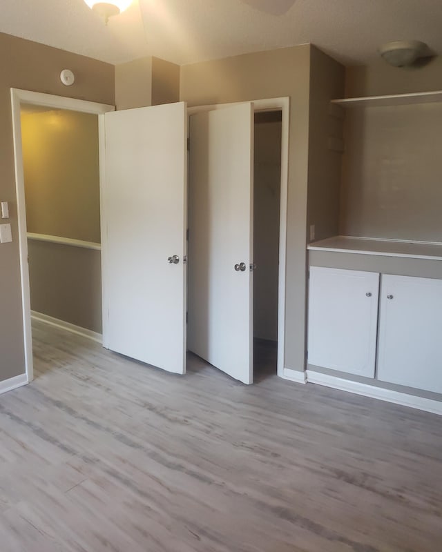 unfurnished bedroom featuring light hardwood / wood-style floors