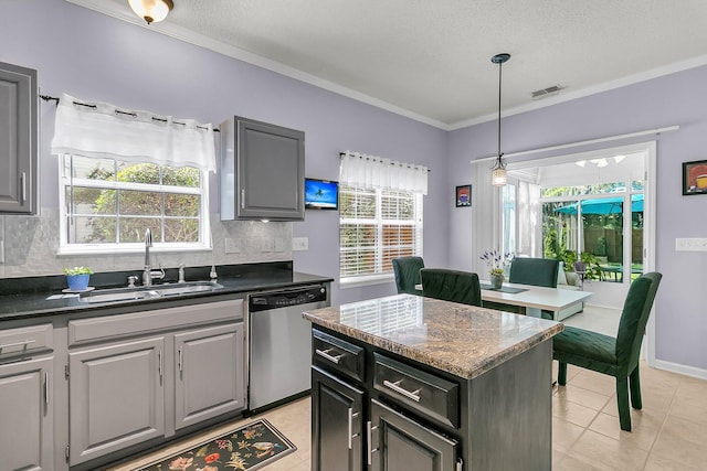 3257 Heathland Way, Mount Pleasant, SC 29466 - kitchen with stainless steel dishwasher, backsplash, crown molding, healthy amount of natural light, and light tile patterned floors