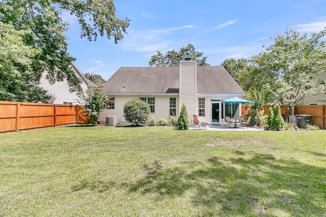 3257 Heathland Way, Mount Pleasant, SC 29466 - back of property with a patio, a fenced backyard, and a chimney