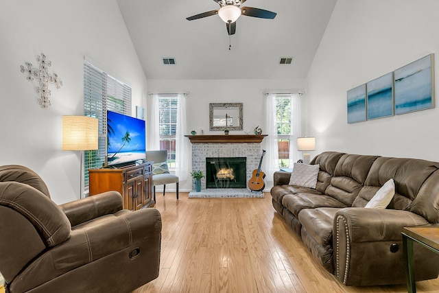 3257 Heathland Way, Mount Pleasant, SC 29466 - living room with a ceiling fan, light wood-style flooring, high vaulted ceiling, and a brick fireplace