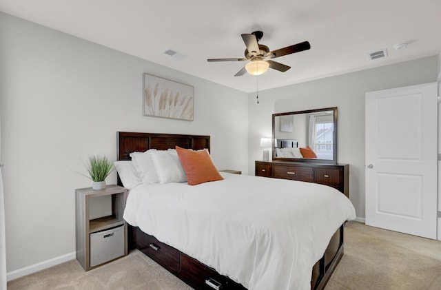 carpeted bedroom with ceiling fan