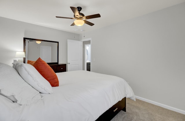 bedroom with light carpet and ceiling fan