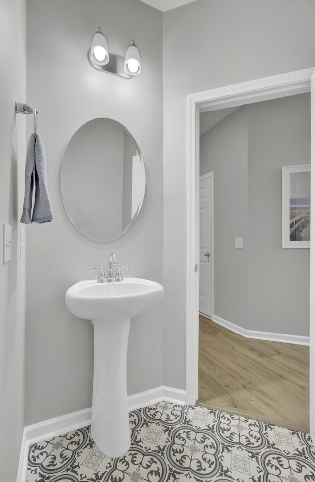 bathroom with tile patterned floors