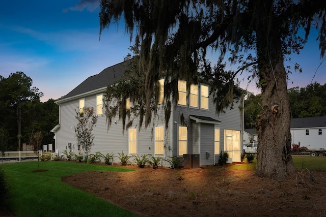 view of front of home with a lawn