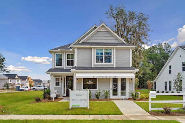 view of front facade with a front lawn