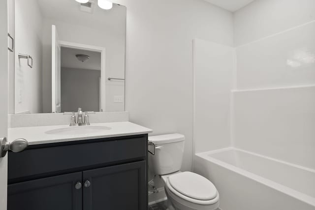 full bathroom featuring shower / bathing tub combination, vanity, and toilet