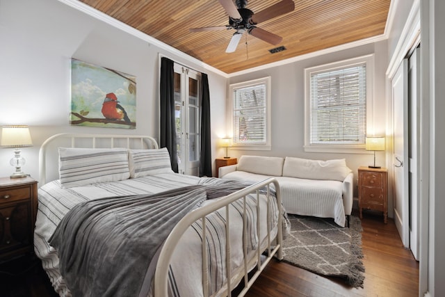 2218 Myrtle Ave, Sullivans Island, SC 29482 - bedroom featuring wood ceiling, ornamental molding, hardwood / wood-style floors, and ceiling fan