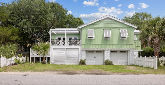 2218 Myrtle Ave, Sullivans Island, SC 29482 - view of front of property with an attached garage and driveway