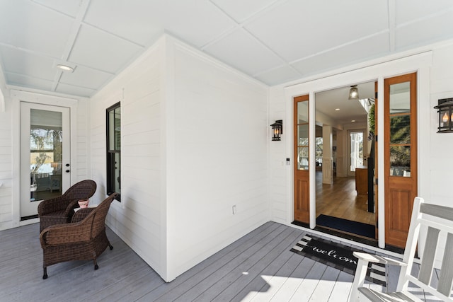 wooden deck featuring covered porch