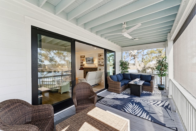 deck with ceiling fan and an outdoor hangout area