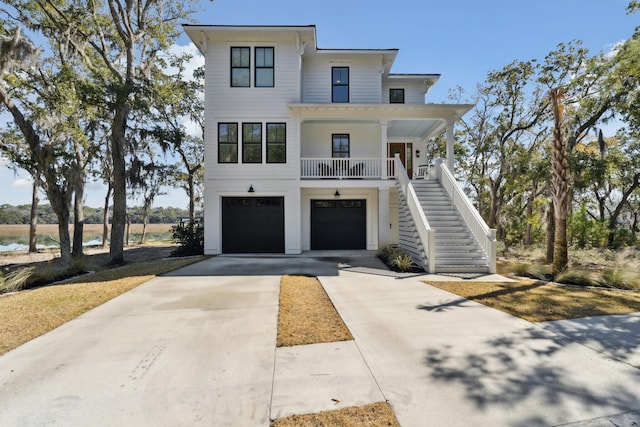 view of front of house featuring a garage and a porch