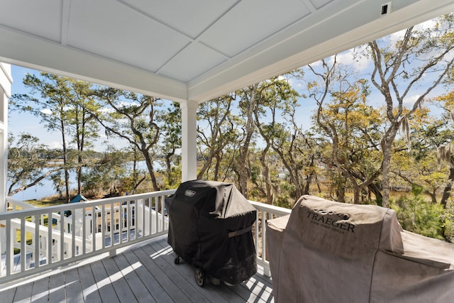 wooden terrace with grilling area