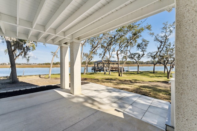 view of patio / terrace featuring a water view