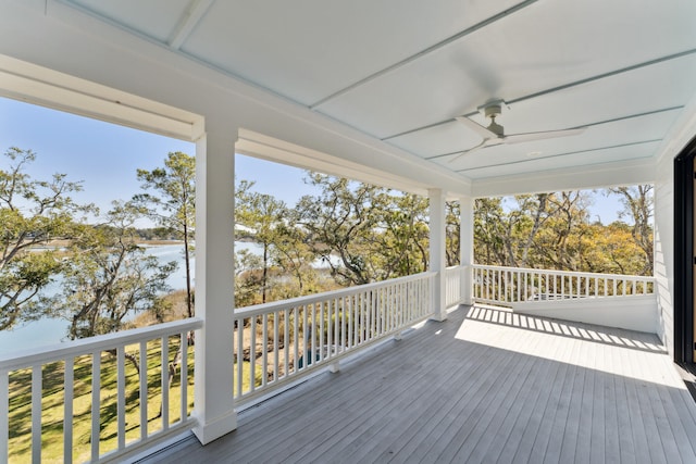 deck featuring a water view and ceiling fan