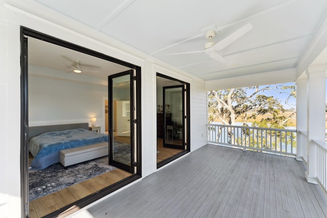 wooden terrace with ceiling fan