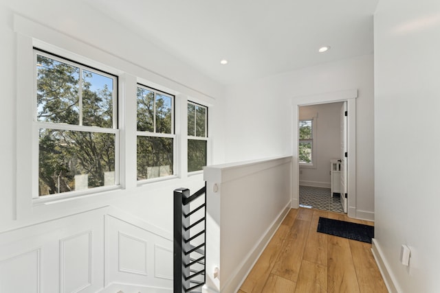 hall with light wood-type flooring