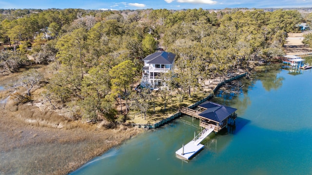 birds eye view of property featuring a water view