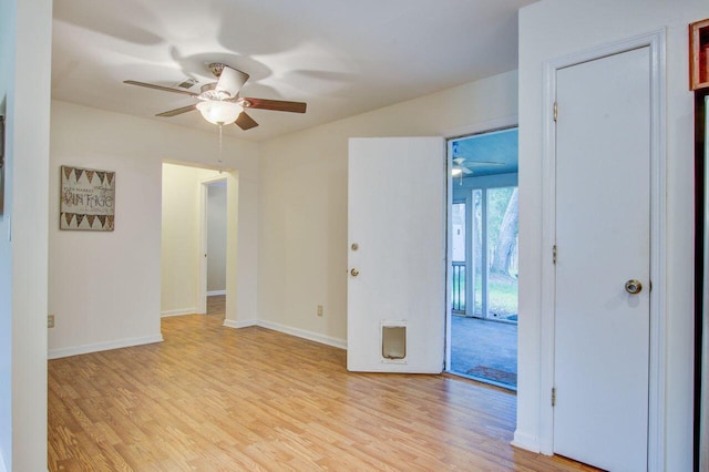 unfurnished room featuring ceiling fan and light wood-type flooring